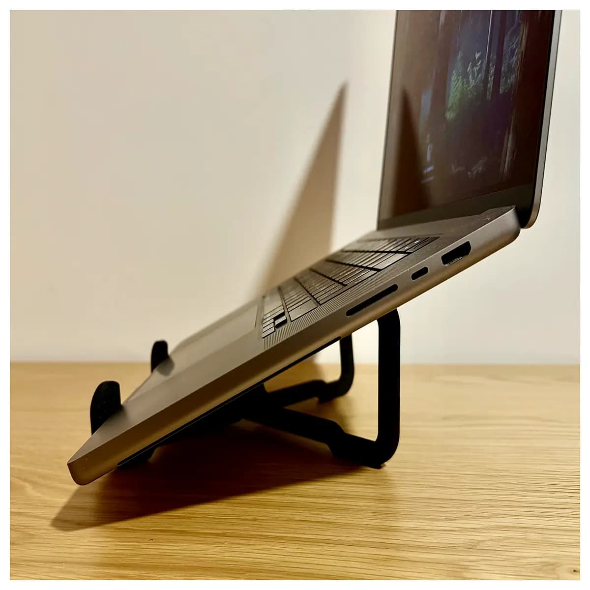minimalist laptop riser ergonomic aluminum alloy portable adjustable desktop holder for home office work from home cooling ventilation